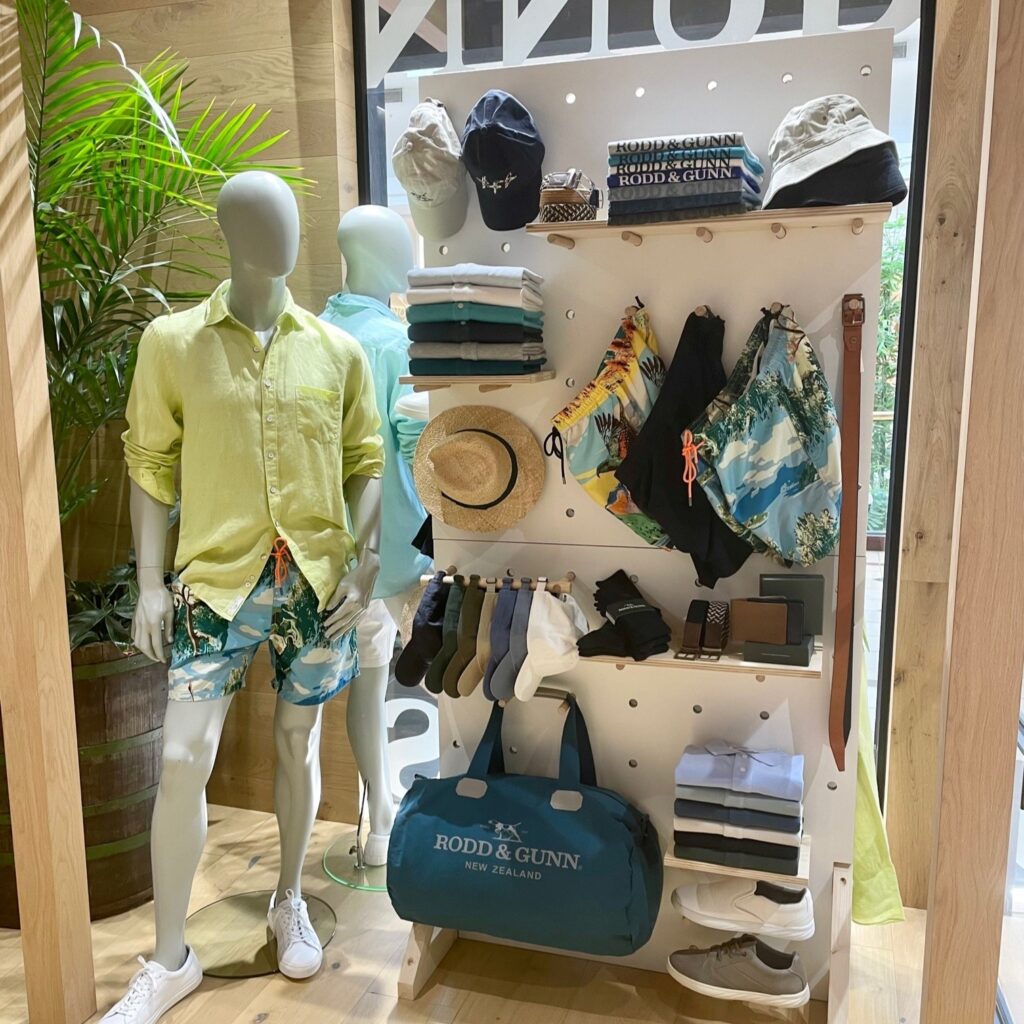flexible pegboard display for permanent fitouts - rodd and gunn garment display using a freestanding white pegboard
