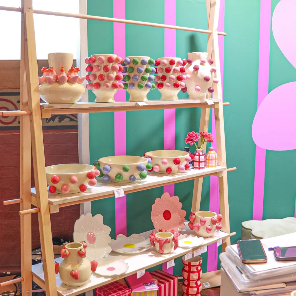 create an expo stand - noss and co using three tier a-frame as tiered shelving in their life instyle 2025 stand