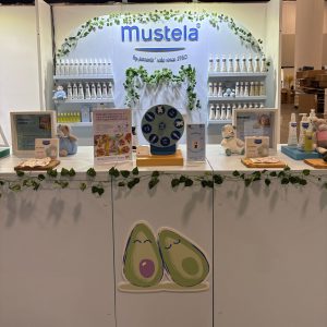 EOFY Retail Refresh: 7 Investments That Improve Customer Experience And Store Performance 13 OFB FAIR - Stand Mustela_custom painted curved back wall_painted events bar