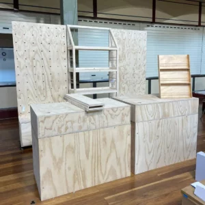 Finders Keepers freestanding shelving wall and pos tables and card stand