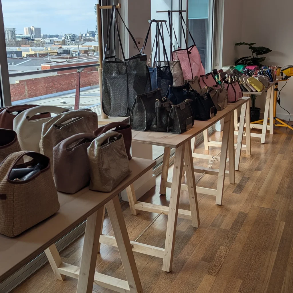 the hunted co using the trestle table their display solutions for their bags at their melbourne tradeshow 2025