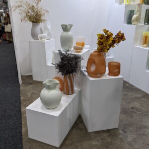 White painted plinths configured in arrangement with some on their side