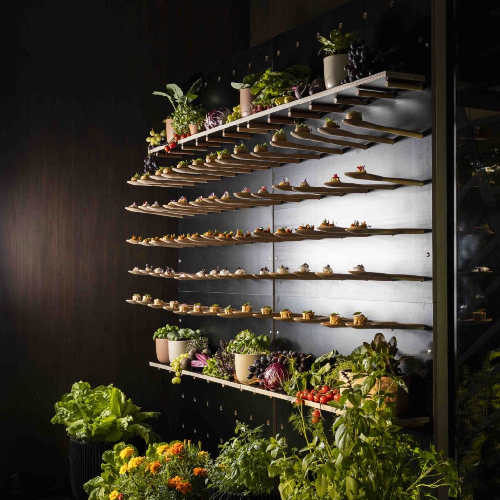 Pegboard Displays Are the Most Versatile Merchandising Tool - black freestanding pegboard used for food display