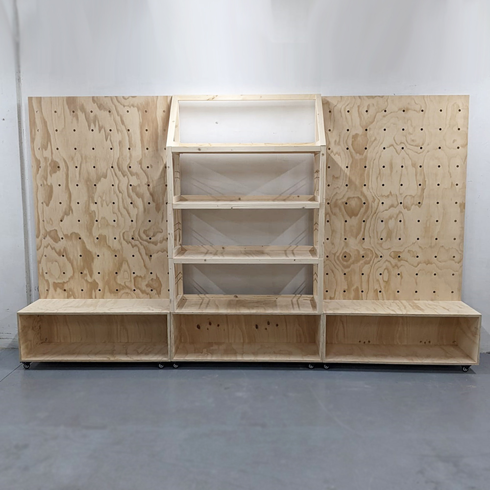 pegboard with cabinet and stacked shelving unit