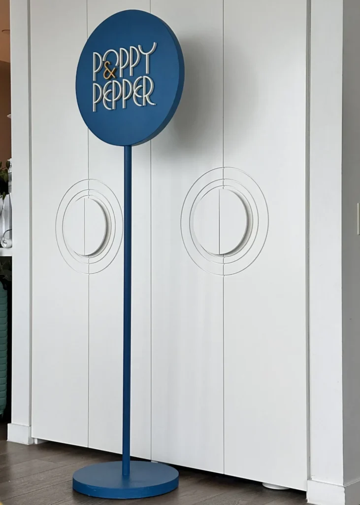 update your retail reception area - signage element and branding in your reception area using the lollipop sign with the brand logo