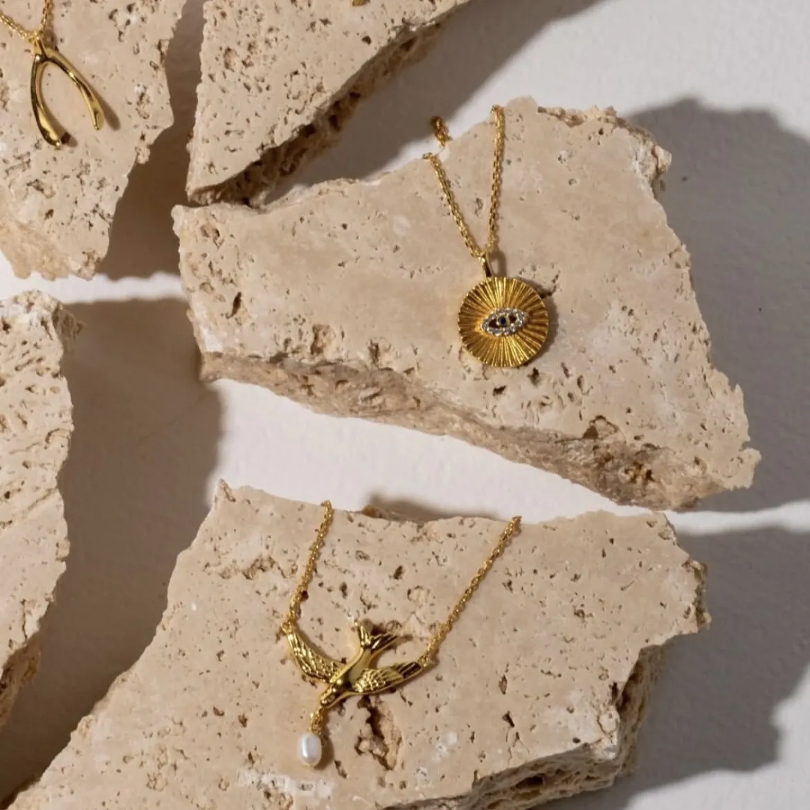 bowerbird bluebird and pearl necklace