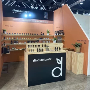 Tradeshows 1 dindi naturals life instyle sydney 2025 set up using wall mounted shelving, msc counter, plinths and custom step shelves