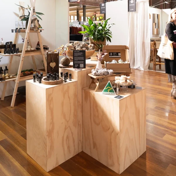 essential display furniture - Plywood Plinths in varied heights with products displayed on top