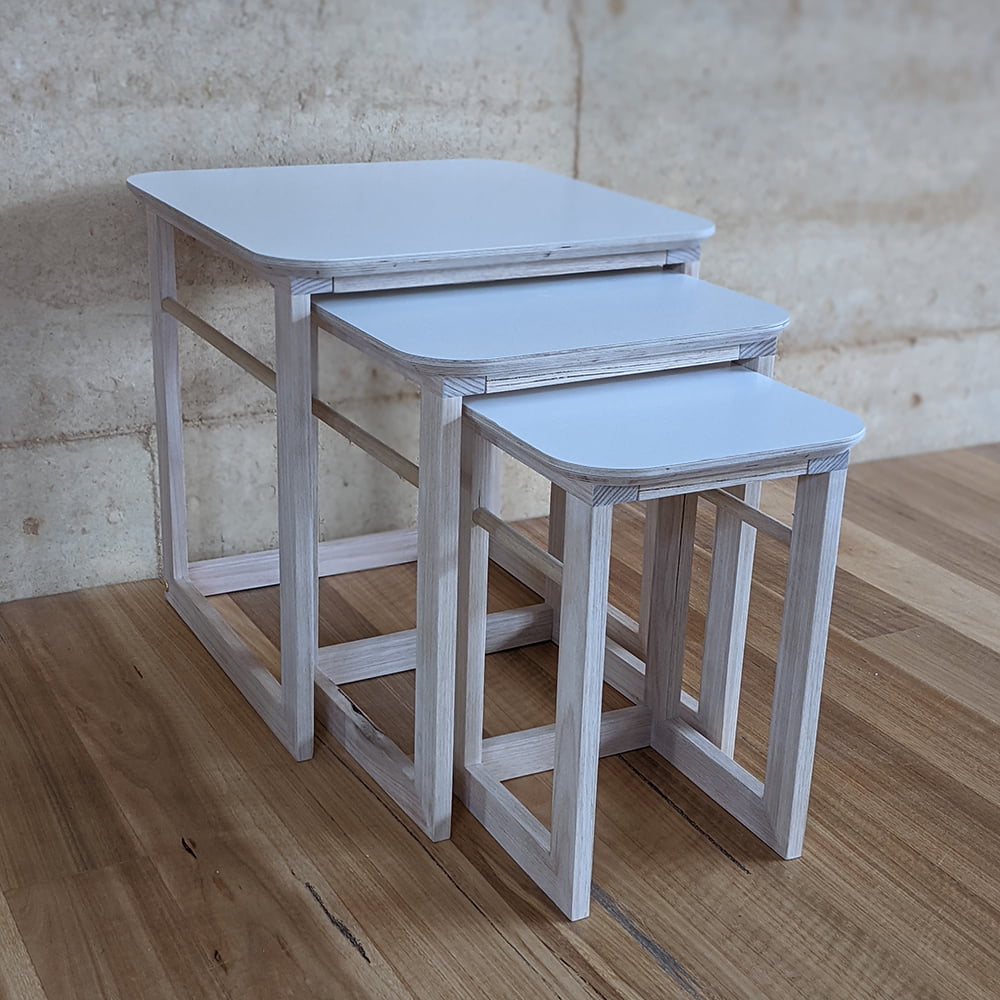 white nesting tables by market stall co