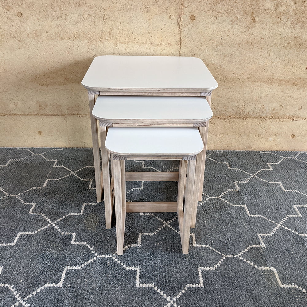 white nesting tables by market stall co