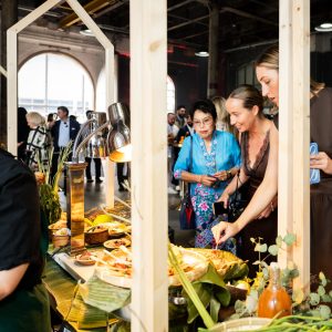 Food Display Ideas That Attract Customers: Visual Merchandising Strategies for Markets, Retail and Events 9 nine good food_market stand with hanging signage bar (3)