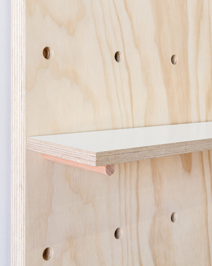 white plywood pegboard shelf