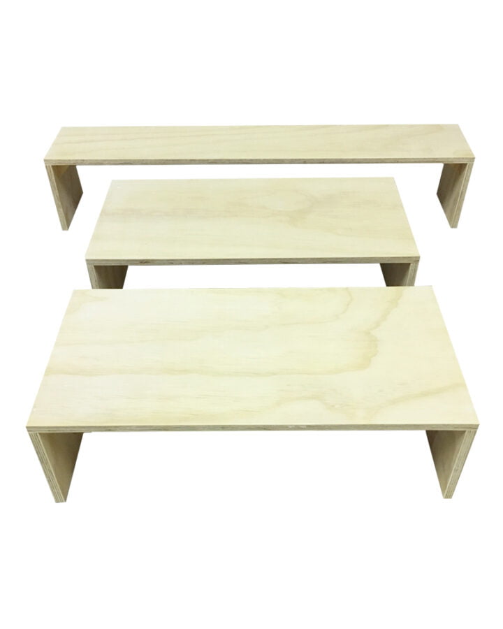 set of three different sized plywood risers