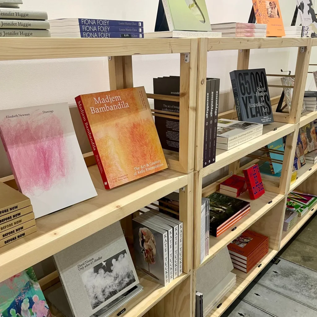essential display furniture - Raw plywood and pine stacked shelving unit with book display