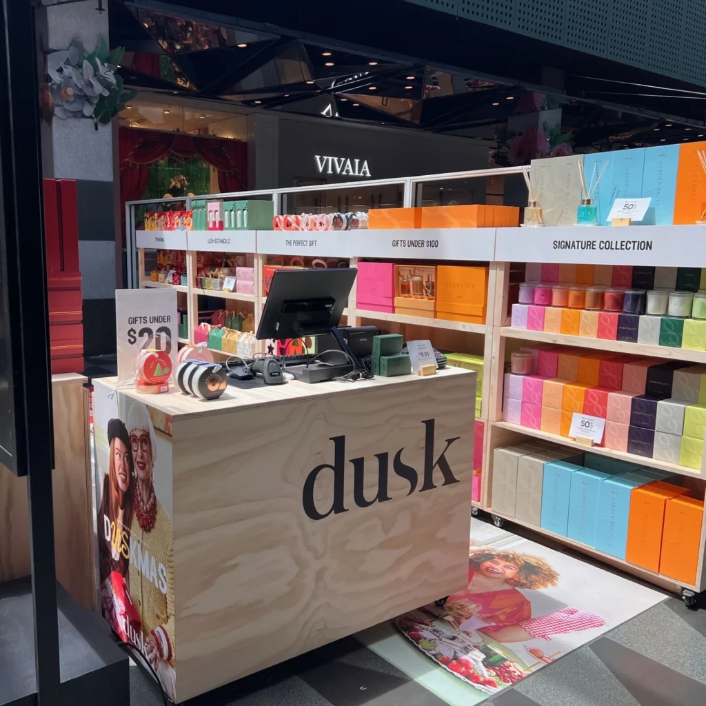 essential display furniture - Plywood Cabinet Style Counter point of sale with vinyl decals at the Duck pop-up
